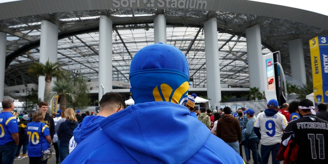 Los Angeles Rams fans get ready for the game between the Los Angeles Rams and the Arizona Cardinals in the NFC Wild Card Playoff game at SoFi Stadium on January 17, 2022 in Inglewood, California.
