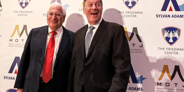 Former US ambassador to Israel David Friedman and former US Secretary of State Mike Pompeo (Photo by Menahem KAHANA / AFP) (Photo by MENAHEM KAHANA/AFP via Getty Images)
