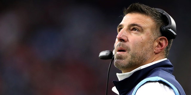 Head coach Mike Vrabel of the Tennessee Titans looks at the scoreboard during the first quarter against the Houston Texans at NRG Stadium on January 09, 2022 in Houston, Texas.