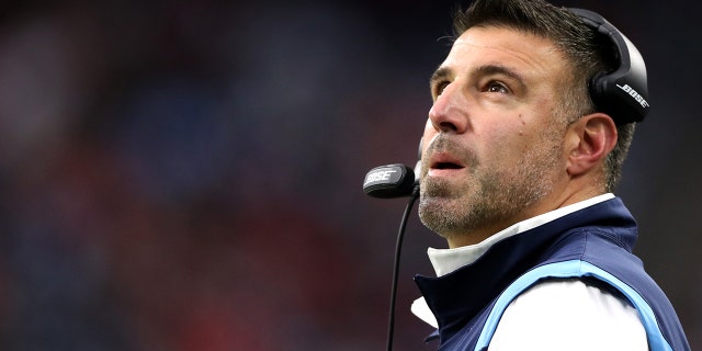 Head coach Mike Vrabel of the Tennessee Titans looks at the scoreboard during the first quarter against the Houston Texans at NRG Stadium on January 09, 2022 in Houston, Texas.