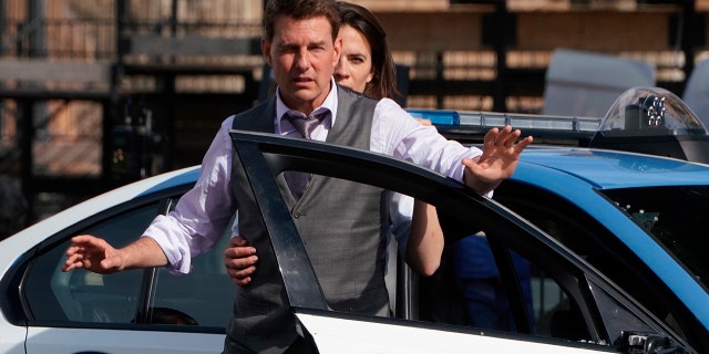 Tom Cruise and Hayley Atwell appear during the filming of "Mission: Impossible 7" in Rome Oct. 13, 2020.