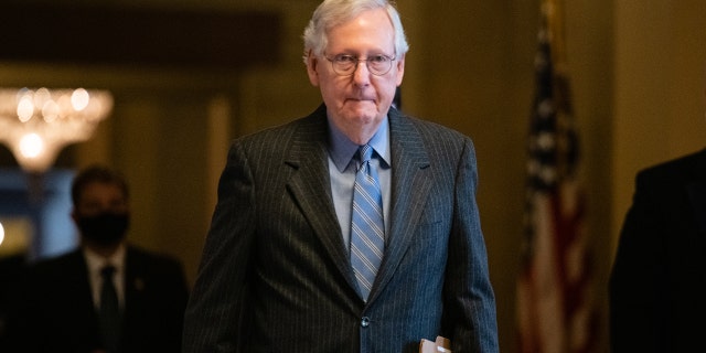 Senate Minority Leader Mitch McConnell, a Republican from Kentucky, walks to the Senate floor at the U.S. Capitol in Washington, D.C., on Jan. 18, 2022.