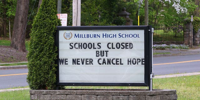 The message board in front of Millburn High School during the COVID-19 pandemic, which reads, "Schools Closed but We Never Cancel Hope" on May 9, 2020, in Millburn, New Jersey.