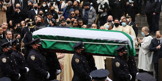 NEW YORK, NEW YORK - JANUARY 28: The casket of fallen NYPD Officer Jason Rivera is brought out of St. Patrick's Cathedral during his funeral on January 28, 2022 in New York City.  (Photo by Spencer Platt/Getty Images)