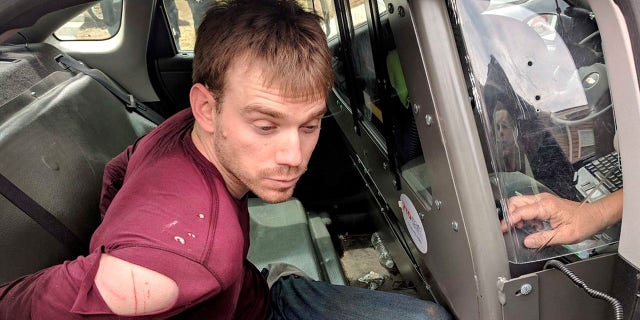 Travis Reinking, the suspect in a Waffle House shooting in Nashville, was arrested by the Metro Nashville Police Department in a wooded area in Antioch, Tenn., April 23, 2018.     