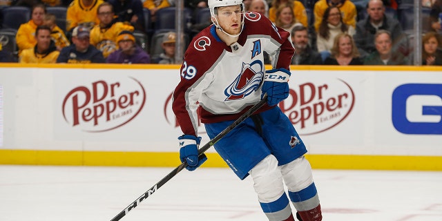 Nathan MacKinnon of the Colorado Avalanche plays against the Nashville Predators at Bridgestone Arena Jan. 11, 2022, in Nashville.