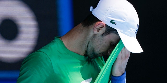 FILE - Defending men's champion Serbia's Novak Djokovic practices on Margaret Court Arena ahead of the Australian Open tennis championship in Melbourne, Australia, on Jan. 13, 2022. Tennis star Djokovic faces deportation again after the Australian government revoked his visa for a second time. Immigration