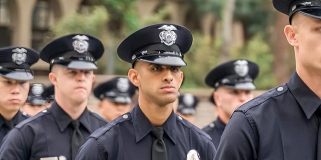 Los Angeles police officer Fernando Arroyos, 27, was killed on Jan. 10 while house hunting with his girlfriend. Four people have been arrested in connection with the murder investigation and federal prosecutors will prosecute the case after Los Angeles County Sheriff Alex Villanueva bypassed the local district attorney.