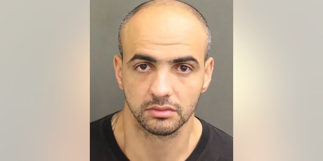 Alessandro Acs, 33, was booked into the Orange County Jail on a first-degree murder charge