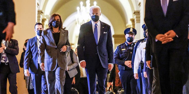 President Joe Biden and Vice President Kamala Harris depart after delivering speeches to mark the first anniversary of the Jan. 6, 2021, attack on the U.S. Capitol. 