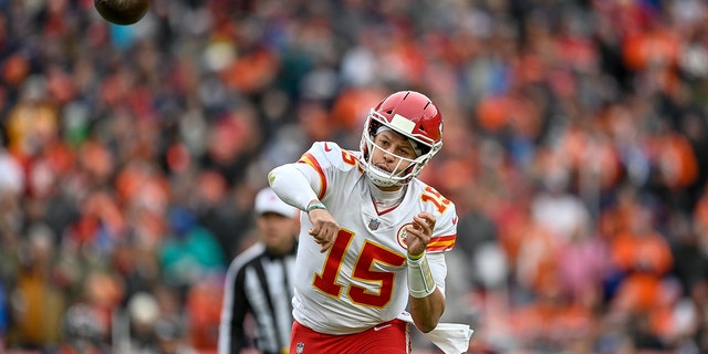 Patrick Mahomes of the Kansas City Chiefs passes against the Denver Broncos at Empower Field at Mile High on Jan. 8, 2022, in Denver, Colorado.