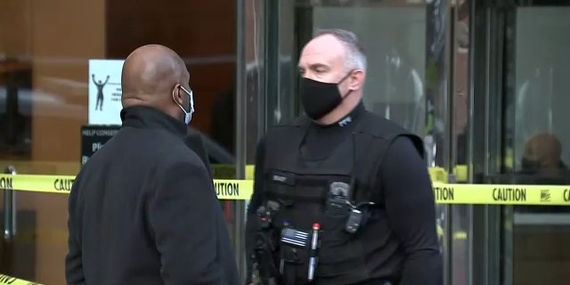 Authorities respond to the Regus building in the neighborhood of Old City following the beating of an unidentified 31-year-old woman on the eighth floor.