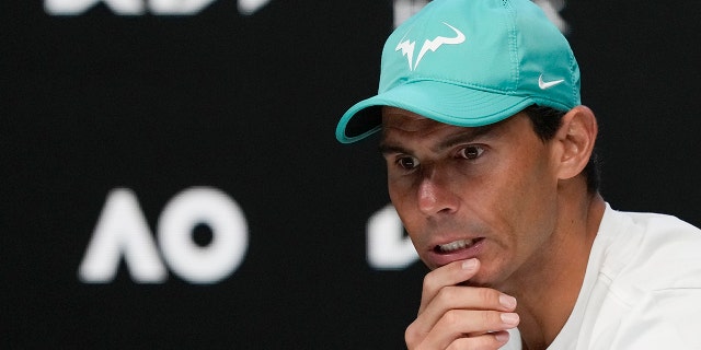 Spain's Rafael Nadal gestures during a press conference ahead of the Australian Open tennis championships in Melbourne, Australia, Saturday, Jan. 15, 2022.