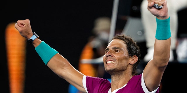 Rafael Nadal of Spain celebrates after defeating Matteo Berrettini of Italy in their semifinal match at the Australian Open tennis championships in Melbourne, Australia, Friday, Jan. 28, 2022.