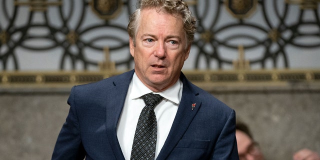 Sen. Rand Paul arrives for a Senate Health, Education, Labor, and Pensions Committee hearing to examine the federal response to COVID-19 on Jan. 11, 2022.