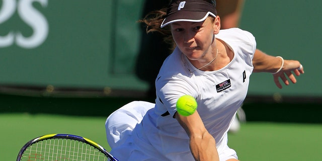 Renata Voracova of the Czech Republic returns a shot to Shuai Peng of China during the BNP Paribas Open in Indian Wells, California, on March 10, 2011.