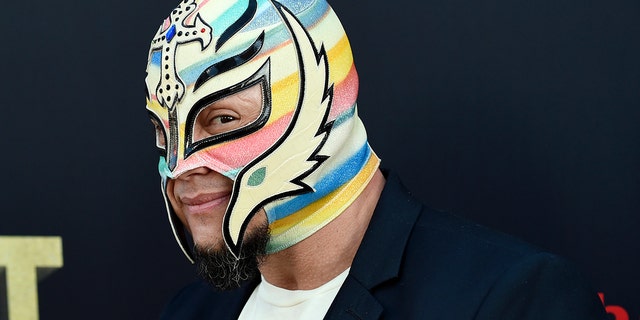 FILE - Professional wrestler Rey Mysterio poses at the premiere of the HBO documentary film "Andre the Giant" at the ArcLight Hollywood on Thursday, marzo 29, 2018, a Los Angeles.