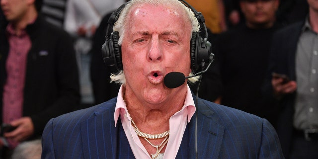 Ric Flair joins a telecast during a basketball game between the Los Angeles Lakers and the New Orleans Pelicans at Staples Center on February 25, 2020 in Los Angeles, California.
