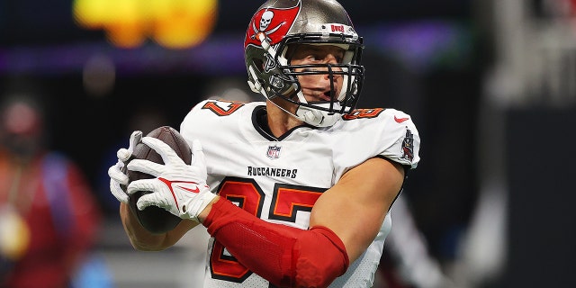 Rob Gronkowski of the Tampa Bay Buccaneers scores a touchdown during the second quarter against the Atlanta Falcons at Mercedes-Benz Stadium on Dec. 5, 2021, ad Atlanta, Georgia.