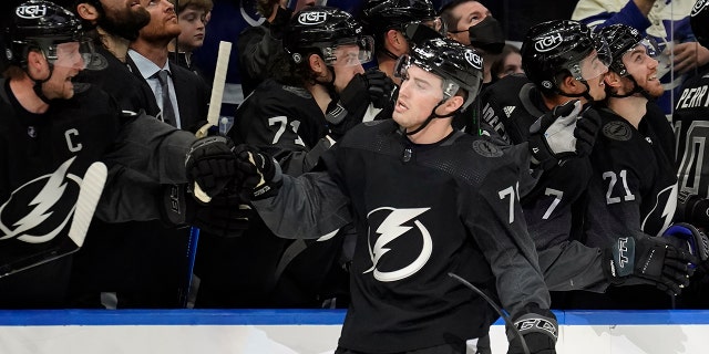 Tampa Bay Lightning center Ross Colton (79) celebrates with the bench after his goal against the Dallas Stars during the third period of an NHL hockey game Saturday, Jan. 15, 2022, in Tampa, Fla.