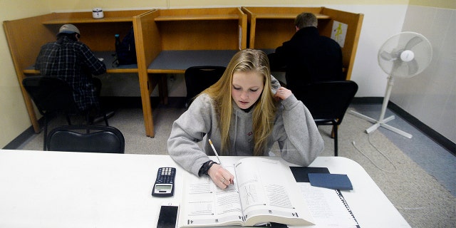 Rachel Barr, 17, of Scarborough, Maine, takes a pre SAT test on Feb. 23, 2016.