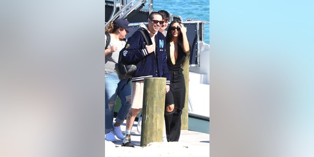 Kim Kardashian and Pete Davidson took their newfound love to the Bahamas. The two were spotted on board a boat on Wednesday.