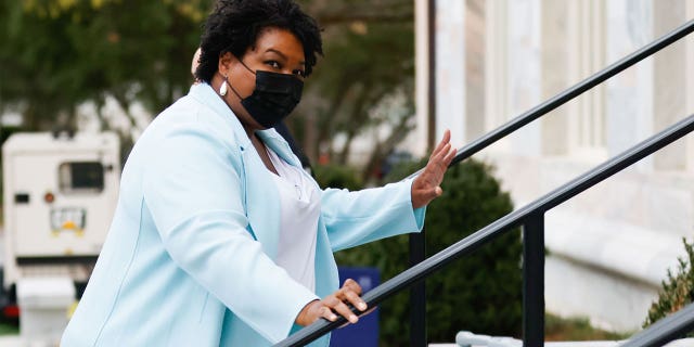 Stacey Abrams, former Georgia gubernatorial candidate, leaves after meeting President Biden and Vice-President Kamala Harris during a stop at Emory University in Atlanta, Georgia, March 19, 2021.