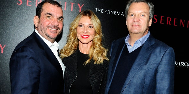 William Sadleir (derecho) pictured here with Bill Grouse and Rhea Grouse has pleaded guilty to wire fraud charges.