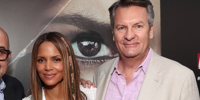 William Sadleir, pictured here with "Kidnapped" actress Halle Berry, pleaded guilty to wire fraud charges.