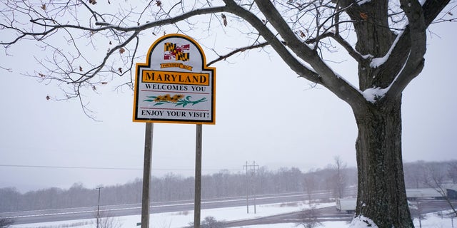 Snow covers the Youghiogheny Overlook Welcome Center in Friendsville, Md. (AP Photo/Julio Cortez)