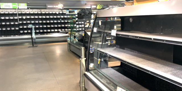 Empty shelves at a grocery store in Washington, D.C.