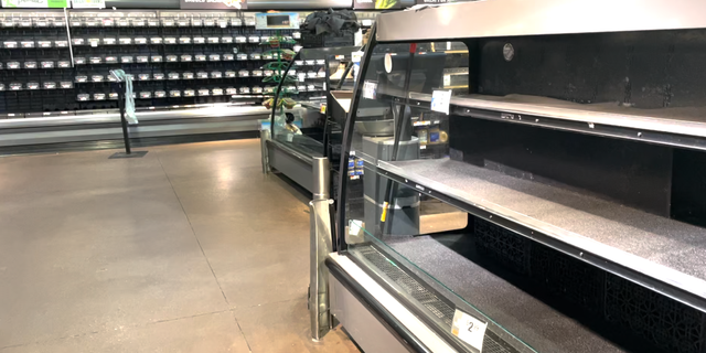 Empty shelves at a grocery store in Washington, D.C.