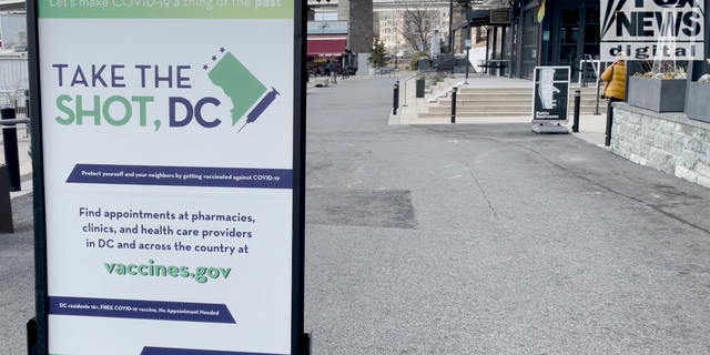 <strong>A sign encourages D.C. residents get the COVID-19 vaccine. </strong>