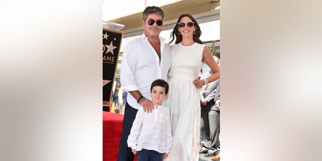 Simon Cowell, Lauren Silverman and their son Eric in 2018.