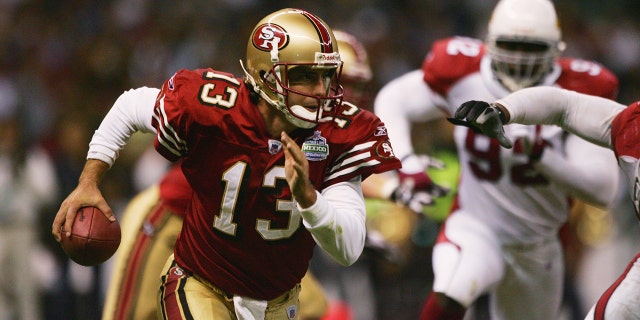 Quarterback Tim Rattay of the San Francisco 49ers scrambles against the Arizona Cardinals at Estadio Azteca on Oct. 2, 2005, in Mexico City.