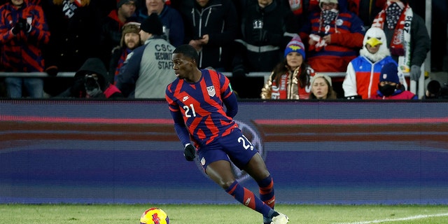 Tim Weah #21 of the United States controls the ball during the World Cup qualifying game against El Salvador at Lower.com Field on January 27, 2022 in Columbus, Ohio.