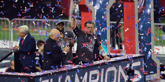 Tom Brady of the New England Patriots raises the Vince Lombardi trophy after the Patriots defeated the Atlanta Falcons 34-28 in overtime of Super Bowl 51 at NRG Stadium Feb. 5, 2017 in Houston.