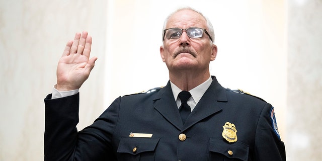 U.S. Capitol Police Chief Tom Manger is sworn in to testify before a Senate Rules and Administration Committee oversight hearing on the Jan. 6, 2021, attack on the Capitol on Wednesday, Jan. 5, 2022, in Washington. 