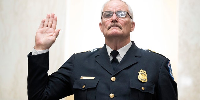 U.S. Capitol Police Chief Tom Manger is sworn in to testify before a Senate Rules and Administration Committee oversight hearing on the Jan. 6, 2021, attack on the Capitol on Wednesday, Jan. 5, 2022, in Washington.