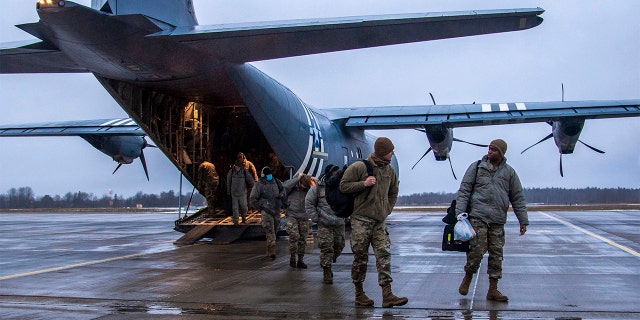 Airmen from the 4th Fighter Wing at Seymour Johnson Air Force Base, N.C. and the 48th Fighter Wing, Royal Air Force Lakenheath, England, arrive at Ämari Air Base, Estonia, Jan. 24, 2022.