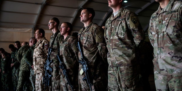  U.S. Army soldiers attend as NATO Secretary General Jens Stoltenberg visits the Italian-run military base "Camp Arena" to meet the soldiers in the context of the Nato Resolute Support (RS) mission.