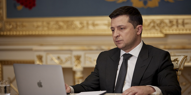 Ukrainian President Volodymyr Zelenskyy answers questions from the media in Kyiv, Ukraine.