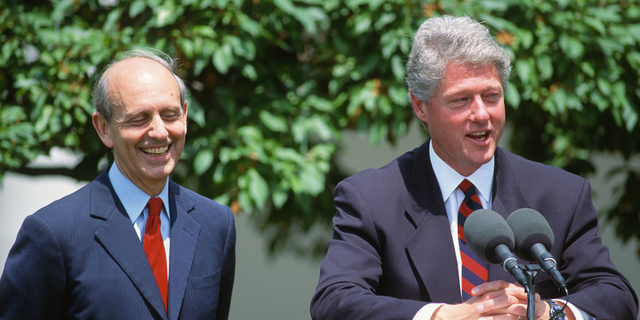 Then-U.S. Court of Appeals Chief Judge Stephen Breyer, left, listens as President Clinton names Breyer a Supreme Court associate justice during a news conference outside the White House, May 13, 1994.