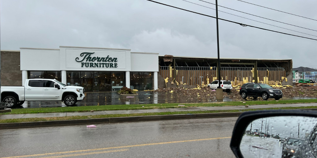 Structural damage at a furniture store in Bowling Green, Kentucky, following a tornado warned storm going through the area. (Credit: @BGTonite)