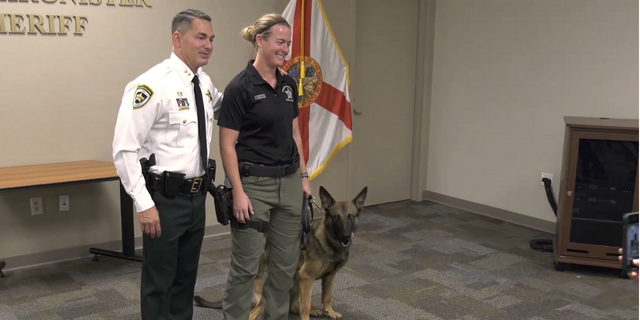 Sheriff Chad Chronister with Deputy Sarah Ernstes and K-9 Roy (Credit:  Hillsborough County Sheriff's Office) 