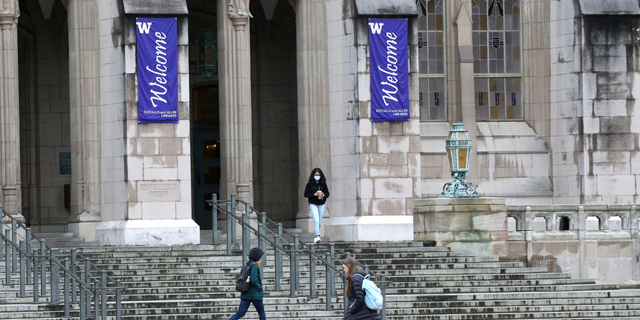 Students at the University of Washington are on campus for the last day of in-person classes on March 6, 2020 in Seattle, Washington.