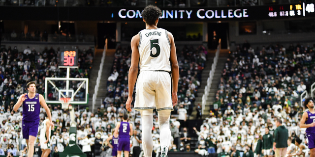 Michigan State Spartans guard Max Christie (5) walks down court during a college basketball game between the Michigan State Spartans and the Northwestern Wildcats on January 15, 2022 at the Breslin Student Events Center in East Lansing, MI..