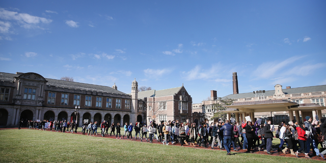  People protest at Washington University to draw attention to police abuse on December 1, 2014 in St. Louis, Missouri.