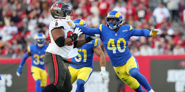 Tampa Bay Buccaneers Offensive Guard Nick Leverett (60) pass blocks Los Angeles Rams Linebacker Von Miller (40) during the NFC Divisional game between the Los Angeles Rams and the Tampa Bay Buccaneers on January 23, 2022 at Raymond James Stadium in Tampa, Florida.