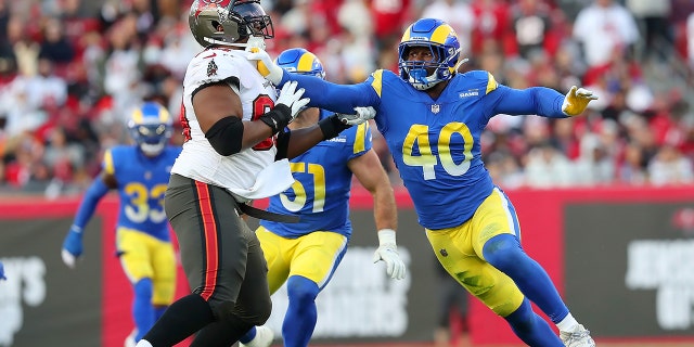 Tampa Bay Buccaneers Offensive Guard Nick Leverett (60) pass blocks Los Angeles Rams Linebacker Von Miller (40) during the NFC Divisional game between the Los Angeles Rams and the Tampa Bay Buccaneers on January 23, 2022 at Raymond James Stadium in Tampa, Florida.